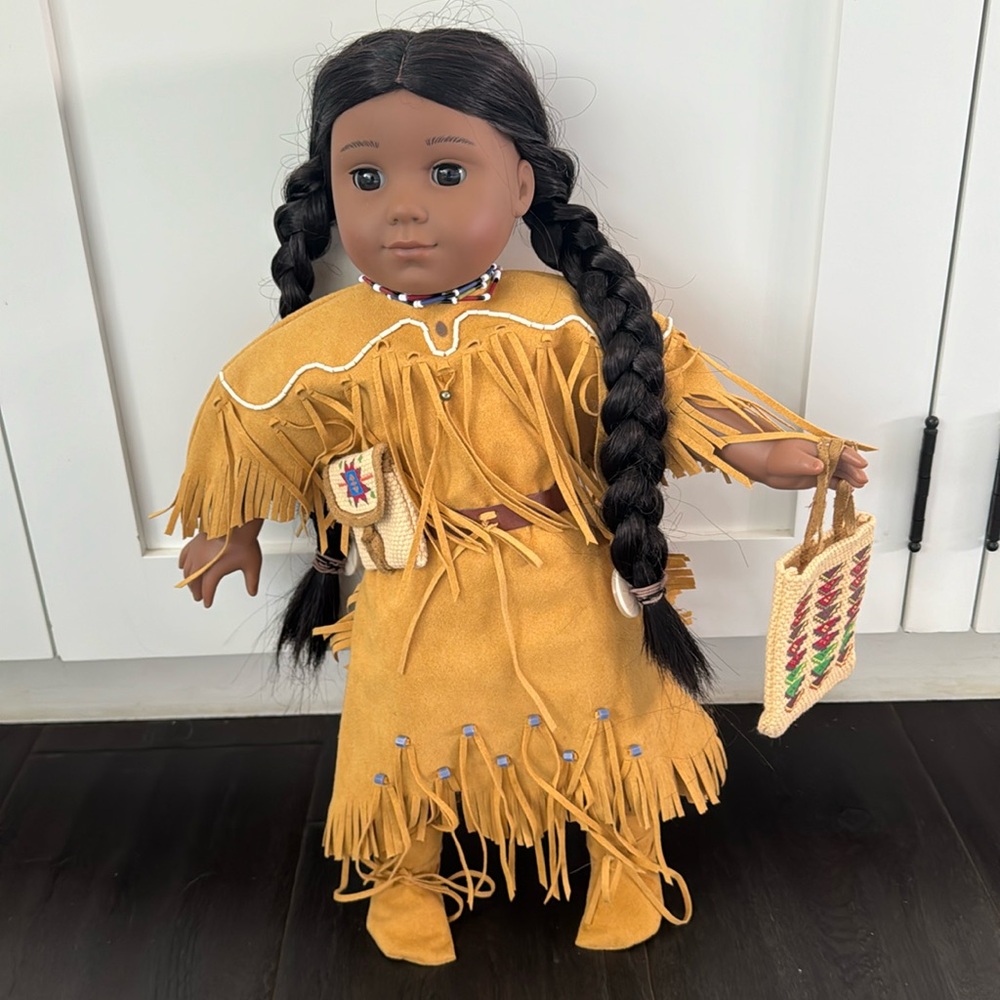 American Girl Doll 18” Kaya doll, original costume plus extra necklace/purse.